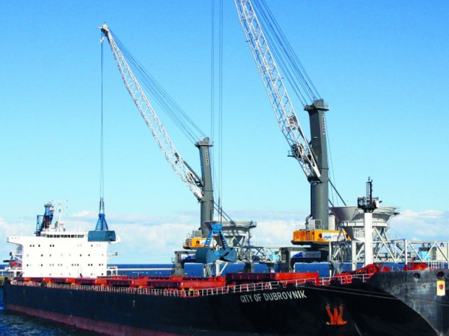 Liebherr presenta la tecnología inteligente para cucharas “SmartGrip“ para el trasbordo de mercancías a granel